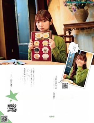 A woman in a yellow sweater and plaid skirt talking on a cell phone.