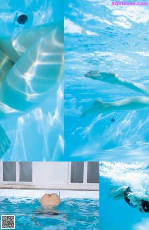 A man swimming in a pool with his arms outstretched.